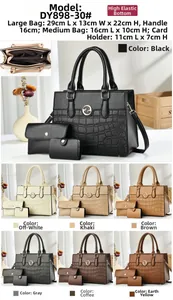 Three-piece handbag set with crocodile pattern, including large tote and coin purses