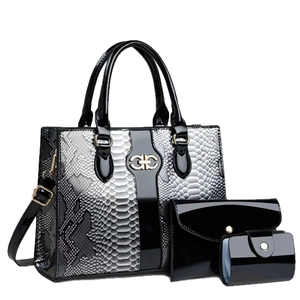 Chic black snakeskin embossed 3-piece handbag set with golden G-buckle for women