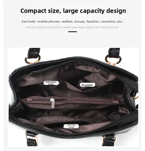 Interior layout of the black leather handbag showing multi-functional storage compartments