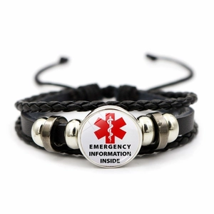 Detail of medical alert braided leather bracelet with emergency information badge