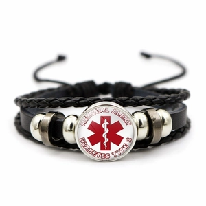 Close-up of leather medical alert bracelet with Type 2 Diabetes Star of Life glass charm
