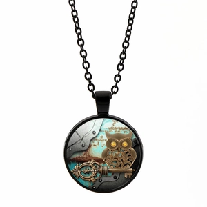 Detail of steampunk owl pendant with antique key and gear textures on a black chain