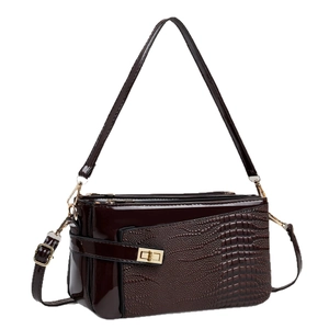 Brown faux leather crossbody bag with crocodile pattern and golden metal buckle clasp