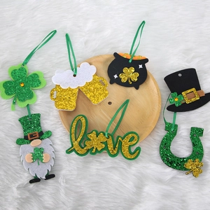 Green glitter St. Patrick's Day felt ornaments set with shamrock and lucky charm designs
