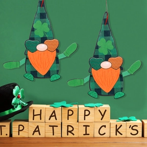 St. Patrick's Day gnome door hangers with green plaid hats and shamrock details
