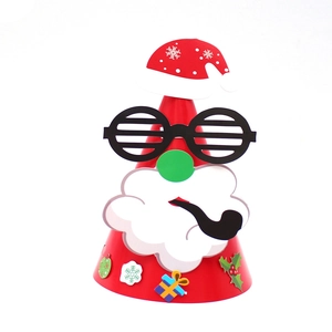 DIY red cone Christmas party hat for kids with Santa beard and reindeer paper decor