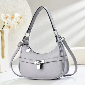 Chic light grey lychee leather hobo bag with silver lock and adjustable shoulder strap
