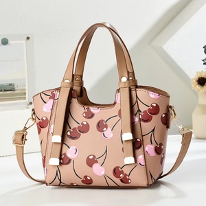Elegant dumpling handbag in apricot with red cherry print and detachable strap