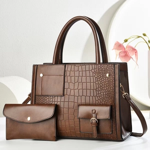 Brown crocodile embossed tote bag set with golden hardware and matching envelope clutch