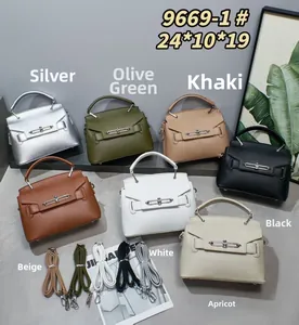 Detailed array of 7 colors of minimalist pebbled leather handbags with metal clasp closure