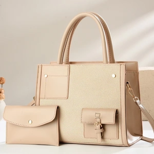 Two-piece beige tote bag set featuring canvas patchwork and a matching envelope clutch