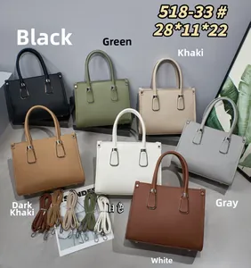 Close-up of litchi grain faux leather tote bags in various colors with adjustable straps