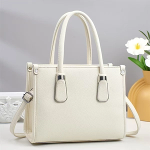 Chic cream white lychee leather tote bag with silver hardware and shoulder strap