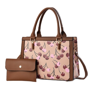 Classic cherry print tote bag and mini pouch set in brown PU leather with golden hardware