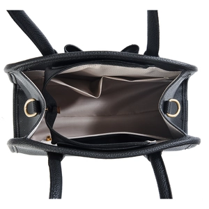 Interior view of large black lychee leather tote with multiple compartments and gold hardware