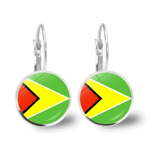 Macro detail of silver drop earrings featuring Guyana flag gem glass cabochons