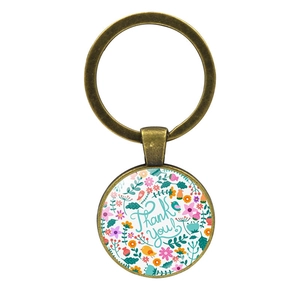Vintage bronze Thank You keychain with floral design and protective glass dome