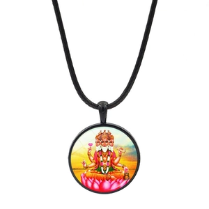 Macro shot of Hindu god Brahma pendant on black cord necklace with colorful detail