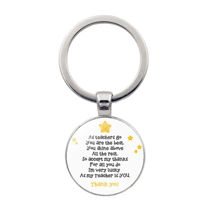 Detail of silver metal keychain with inspirational teacher appreciation poem on round pendant