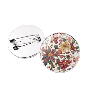 Detailed front and back view of Mandala flower glass brooch with metal pin backing