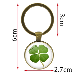 Porte-clés trèfle à quatre feuilles en verre et bronze vintage avec indications de taille