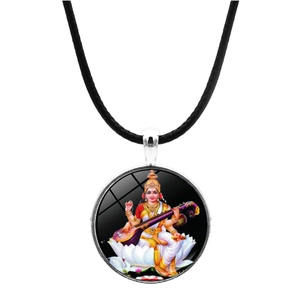 Macro detail of Saraswati goddess pendant with silver frame and black woven rope