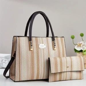 Two-piece set of woven striped tote and wallet with black leather handles and metal logo
