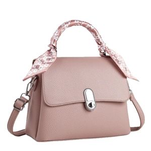 Chic pink lychee leather handbag with silk scarf handle and silver oval lock