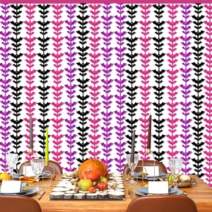 Close-up of Halloween bat foil fringe curtain in black purple and pink for party decor