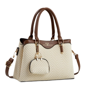 Retro beige woven handbag with brown leather trim and detachable shoulder strap