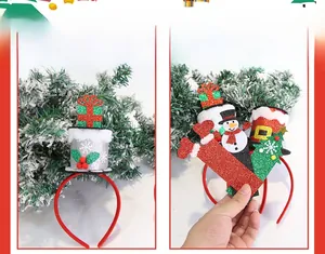 Detail von Weihnachts-Haarreifen mit Pailletten-Minihüten, Bäumen und Schneemännern