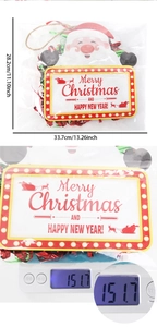 Detailed dimensions and weight of Santa Claus Christmas door sign with red green tassels