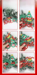 Macro view of Christmas party glasses with glitter reindeer and tree decorative details