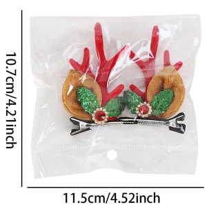 Christmas reindeer antler hair clips with bells and holly leaves for holiday festivities