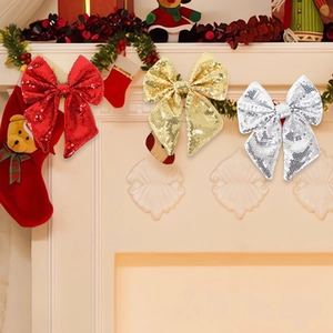 Fiocchi di Natale scintillanti in rosso, oro e argento con paillettes per decorazioni