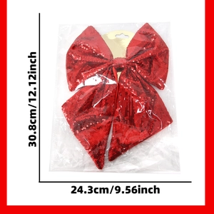 Dettaglio dimensioni del grande fiocco natalizio con paillettes rosse e luccicanti