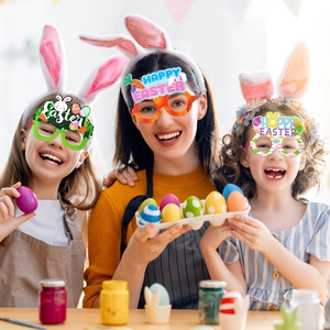 Kids and adults wearing colorful Easter paper glasses and rabbit ear headbands