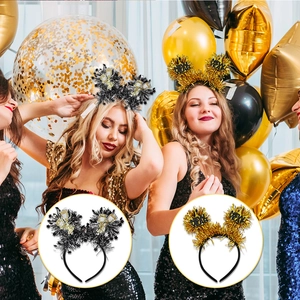 Detail of Happy New Year headbands with tinsel pompoms for 2026 Eve party decorations