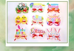 Flat lay showing a 9-piece set of Easter party glasses with bunny and egg paper frames