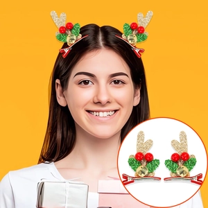 Glittery gold reindeer antler hair clips with bells and red berries for Christmas party
