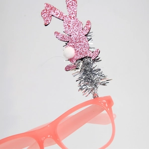 Detailed view of pink sequin bunny ear headband accessory for Easter party glasses