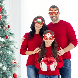 Family wearing creative Christmas party glasses featuring Santa and Snowman designs