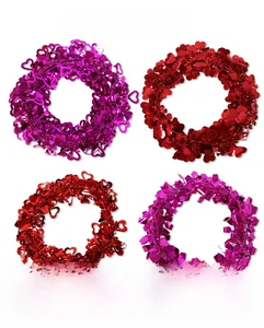 Detail of heart-shaped tinsel garlands for Valentine's Day wedding party decorations