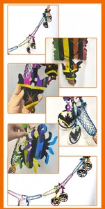Detail of colorful Halloween garland featuring mesh honeycomb bats, ghosts and pumpkins