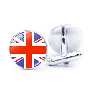 Close-up of silver-tone bullet back cufflinks featuring the classic Union Jack flag design