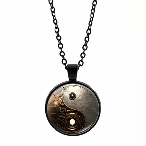 Steampunk yin yang pendant detail featuring mechanical brass gears and metal components