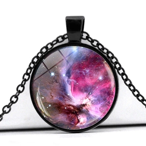 Detailed macro view of the cosmic nebula pendant featuring pink and purple galaxy patterns