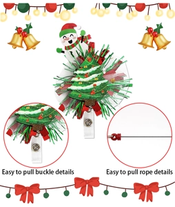 Detail of retractable Christmas badge reel with glitter tree and snowman badge holder