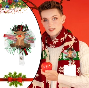 Detail of Christmas retractable badge holder with glitter reindeer and festive tulle accents
