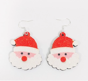 Detailed view of Santa Claus drop earrings featuring glitter accents and red festive hats